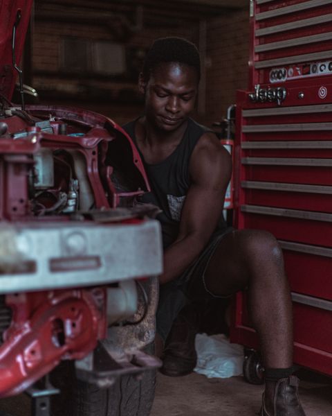 Illustrative automotive services photograph; not ZEUS assets or personnel